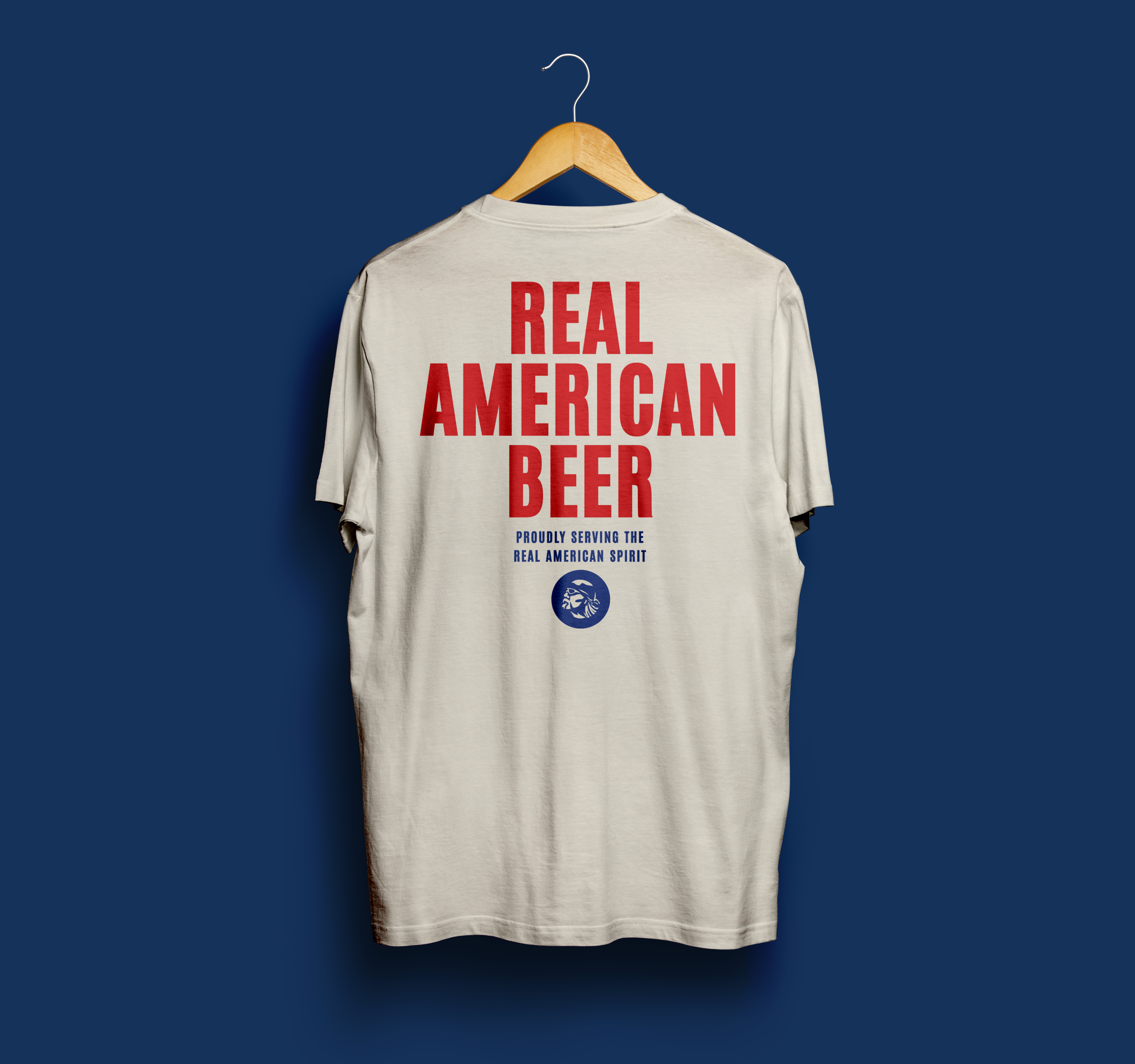 Back – "REAL AMERICAN BEER" on off-white tee